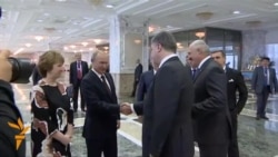 Porošenko i Putin se rukovali na samitu u Minsku
