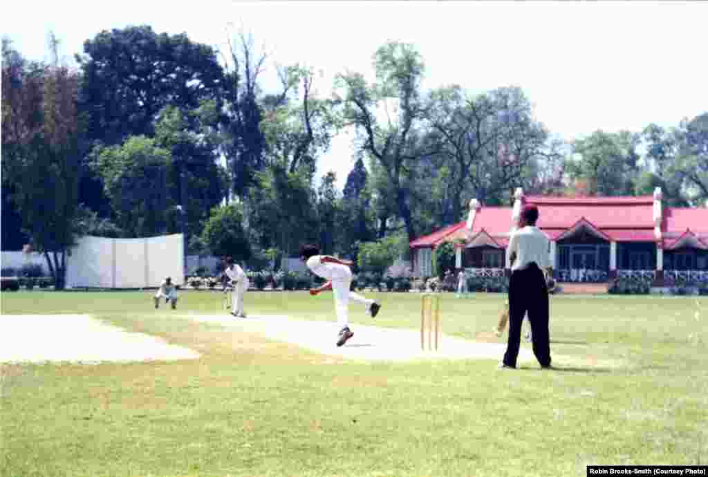 Playing cricket 