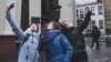 Kiss A Cop, Pay The Price: Forced Apology To Police Statue In Minsk Leads To Flash Mob Kissing 'Attack'