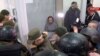 Після того, як вранці 20 грудня Київський апеляційний суд переніс розгляд скарги Кузьменко на арешт на 24 грудня, зокрема через неявку прокурорів у суд, адвокат і група підтримки Кузьменко протягом кількох годин блокували залу судових засідань