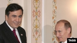 Saakashvili (left) and Putin -- twins under the skin?