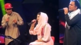 Afghanistan -- Afghan singer Zulala Hashemi (C) performs alongside competitors Sayed Jamal Mubarez (L) and Babak Mohammadi (R) during the television music competition 'Afghan Star' in Kabul, March 9, 2017