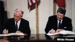 U.S. President Ronald Reagan and Soviet leader Mikhail Gorbachev signing the Intermediate-Range Nuclear Forces Treaty in the Washington in 1987.