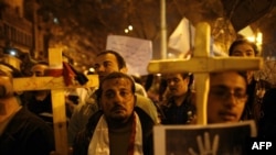 Egyptian Coptic Christians demonstrate outside the state radio and television building in central Cairo.