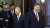 Russian President Vladimir Putin and Chinese President Xi Jinping attend a meeting at the Kremlin in Moscow in May.