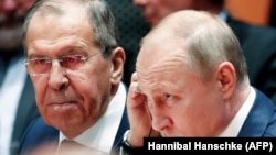Russian President Vladimir Putin (right) and Foreign Minister Sergei Lavrov (file photo)