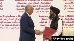 امضای توافقنامه صلح میان نمایندگان امریکا و طالبان در قطر