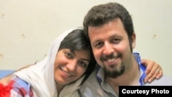 Mahdieh Golrou (left), pictured with political prisoner Vahid La'lipour, said one of the biggest casualties of any war between Iran and Israel would be people's rights.