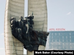 The glorious communist-era monument to the city of Rzeszów, Poland, pairs well with the Hotel Rzeszów's rectilinear architecture (in the background). The '70s-style hotel has since been remodeled and is a very nice and comfortable four-star hotel.