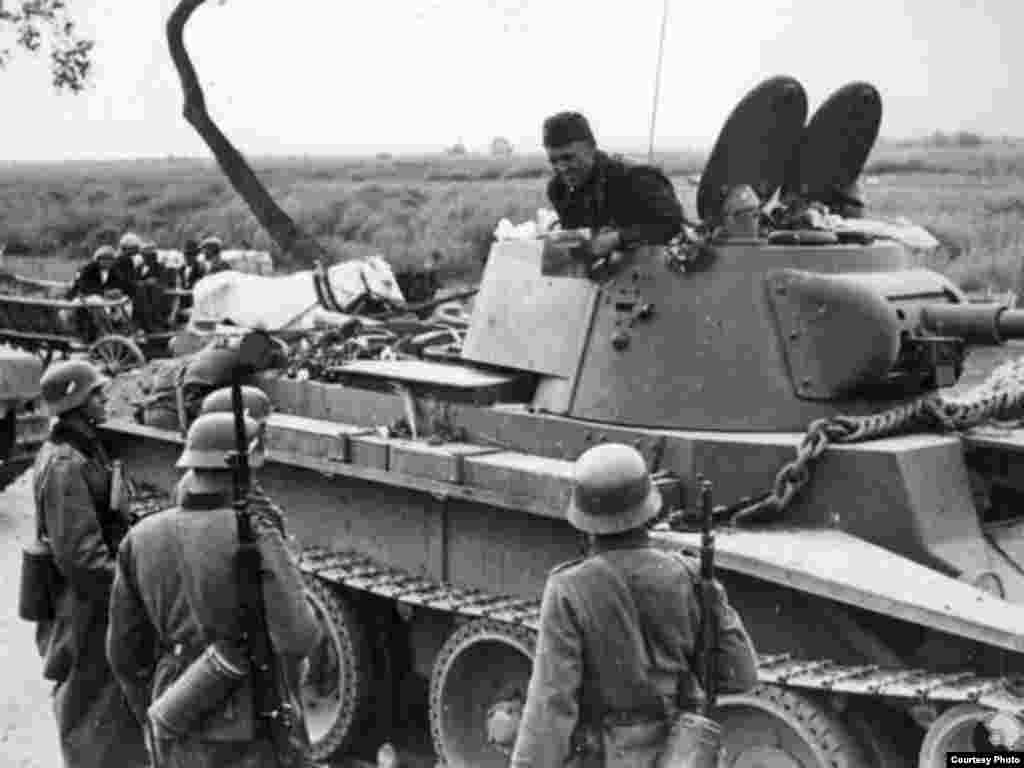 German and Soviet troops meet at the demarcation line, or the so-called "Border of Peace," in September 1939.