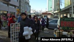 Many Kazakh traders travel across the border to China to buy goods to sell at home in local markets. 