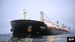 A photo of the Vezhen, which is believed to have damaged an undersea cable between Latvia and Sweden, lies anchored outside a Swedish naval base near Karlskrona on January 27. 