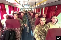 Российские срочники, захваченные в Курской области, возвращаются в РФ в рамках обмена пленными между Россией и Украиной, 14 сентября 2024 года