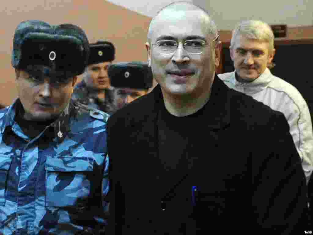 Escorted with his business partner Platon Lebedev to a court in Moscow on January 11, 2010