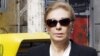 FRANCE, Paris : Empress Farah Pahlavi of Iran leaves the Saint-Louis-en-l'Ile's church, 06 July 2007 in Paris, after attending the funeral mass of Claude Pompidou, 94, the widow of late French President Georges Pompidou. Claude Pompidou died 02 July 2007