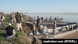 The Amu-Darya river divides Afghanistan and Turkmenistan.