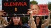 Relatives of defenders of the Azovstal steelworks in Mariupol hold a rally in Kyiv on July 30 demanding that Russia be designated as a terrorist state following the deaths of Ukrainian POWs in a deadly attack on a prison in Olenivka. 