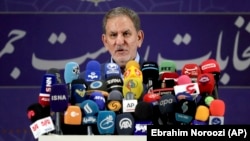 Vice President Eshaq Jahangiri speaks to the media after registering as a candidate for the presidential election at the Interior Ministry in Tehran on May 15.