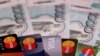 Росіянам розповіли, як на них вплине припинення операцій Visa та Mastercard