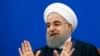 Rohani Coy As He Kicks Off Election Season, Concedes He's 'Not Fully Satisfied'