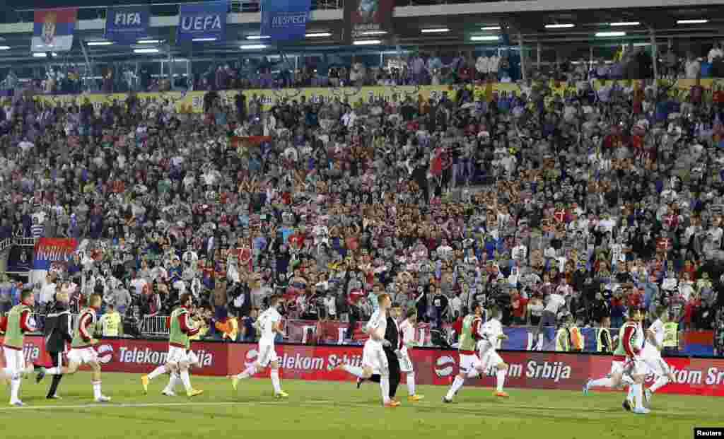 After about a minute of dangerous chaos and the crowd seemingly at fever pitch but the worst of the violence seemingly over, the&nbsp;Albanian team broke for the tunnel. 