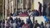 Протестующие привезли тело убитого к зданию областной администрации. Хорог, 25 ноября 2021 года