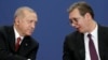 SERBIA -- Turkish President Recep Tayyip Erdogan (L) shakes hands with Serbian President Aleksandar Vucic (R) during their press conference in Belgrade, October 7, 2019