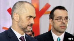 Albanian Prime Minister Edi Rama (left) and his brother, Olsi Rama, whom some blamed for the drone stunt that set off the football melee. (file photo)