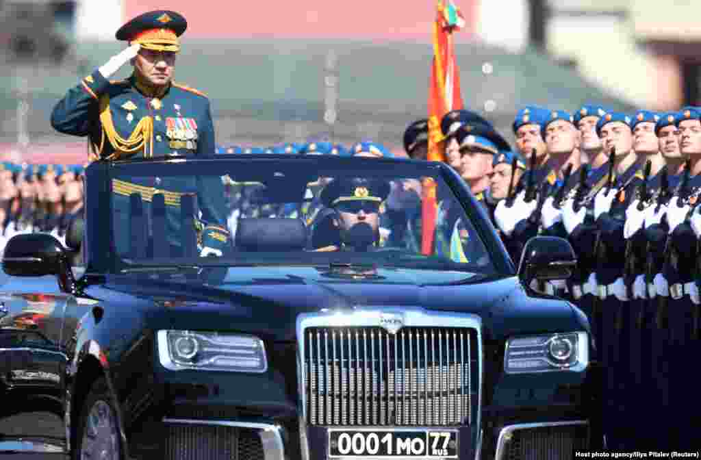 Russian Defence Minister Sergei Shoigu salutes the troops in Red Square.