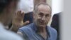 Armenia -- Former President Robert Kocharian waves to supporters during his trial, Yerevan, September 20, 2019.