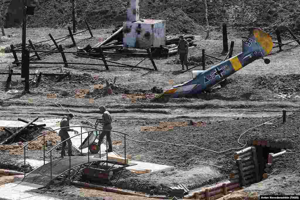 A replica of a crashed German Luftwaffe fighter plane on the grounds of the cathedral. A depiction of the 1941 battle for Moscow is being made near the cathedral's main entrance. 