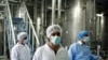 Tehran Cooperating 'Just Enough' To Avoid Sanctions