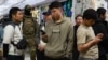 Russia's Migrant Crackdown Expands With Mandatory Mobile Tracking