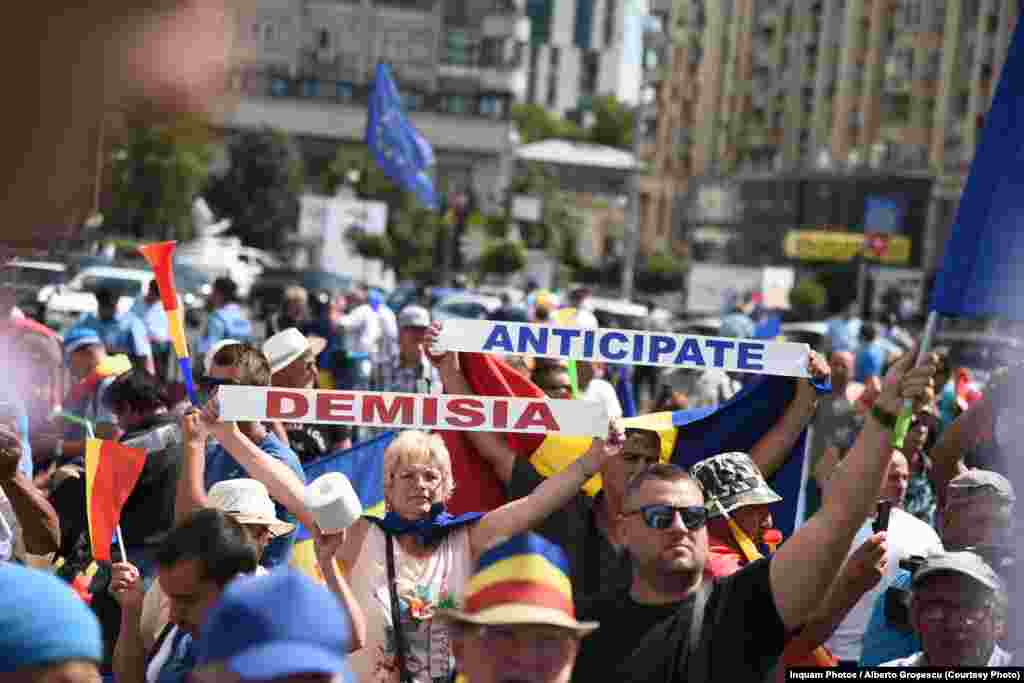 The demonstrators called for Romania's Social Democrat-led government to resign, in part over the ruling coalition's dismissal of the head of the anticorruption agency and its moves to change laws in a way that critics say will make corruption more difficult to prosecute.
