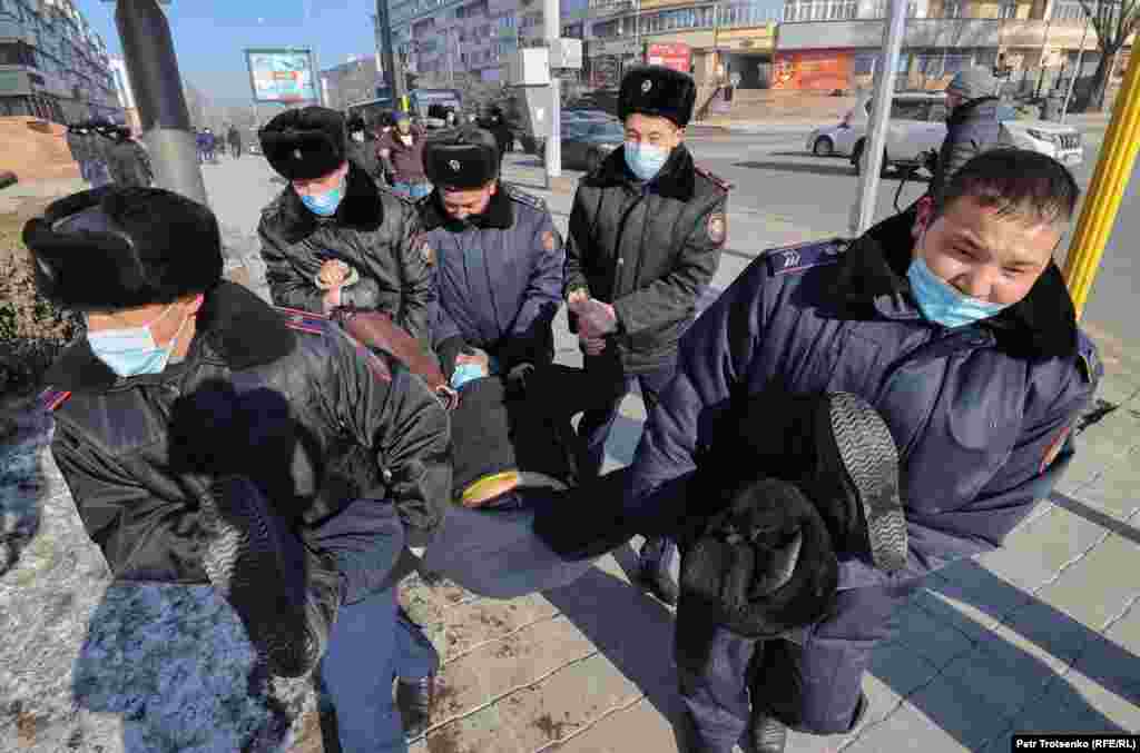 Police detained at least a dozen protesters in Almaty.
