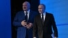 In this pool photograph distributed by the Russian state agency Sputnik, Russia's President Vladimir Putin and his Belarus' counterpart Alexander Lukashenko attend a patriotic forum in Russia's southern city of Volgograd on April 29, 2025, as part of comm